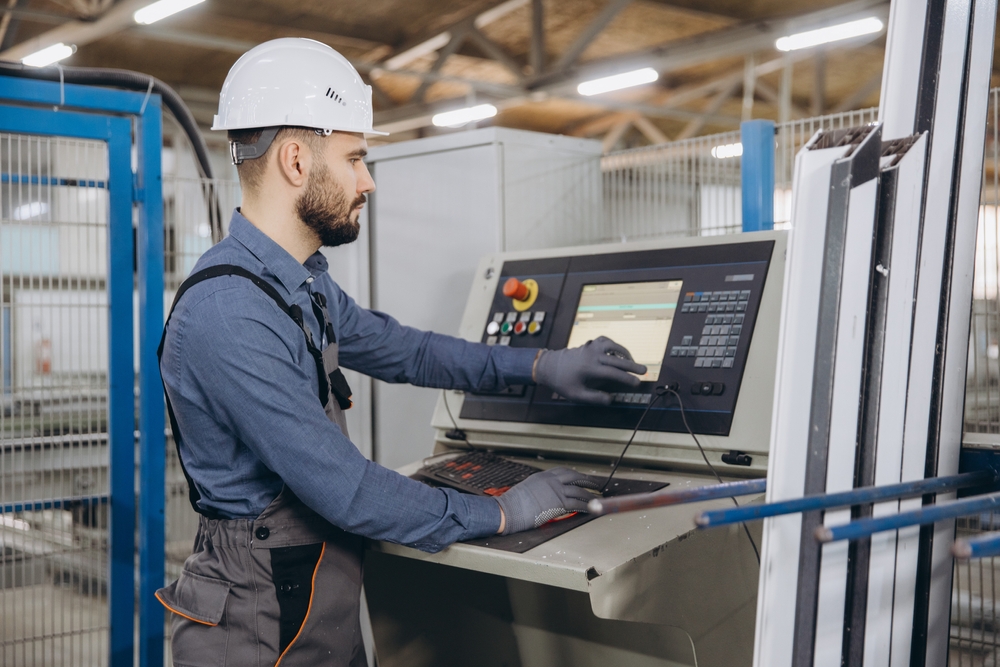factory,worker,programming,computer,numerical,control,machine,for,aluminum,and